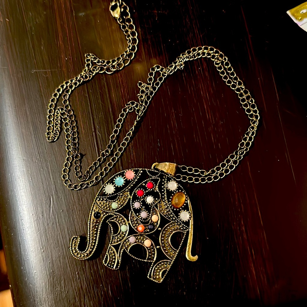 EUC adjustable necklace with colorful elephant charm.